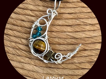 Vente au détail: Pendentif lune argent et perle œil de tigre 