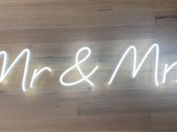 Renting out:  Mr & Mrs neon sign 