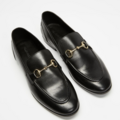 Selling: Black and gold loafer 