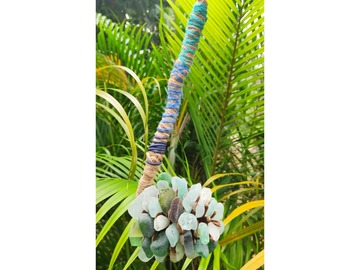  :  decoration with a branch and pine cone attached with sea glass