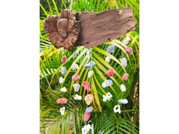  : wall decoration on a piece of tree bark with multicolor corals.