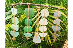  : large wall decoration with sea glass, mainly bottle bottoms.