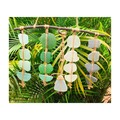  : large wall decoration with sea glass, mainly bottle bottoms.