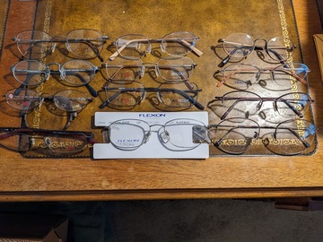 Selling with online payment: One dozen titanium frames from Marchon and Charmant