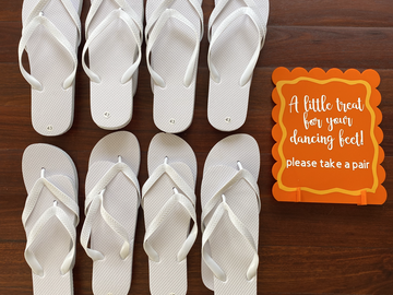 Free: 8x pairs of white wedding guest thongs 