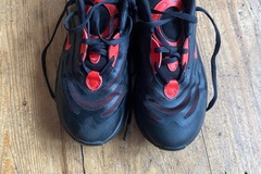 FREE: Black and red Nike trainers 