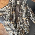 Vente d'un article ou d'un service autre qu'un territoire: Manteau Remington