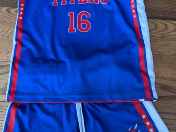 Selling with online payment: Titans reversible singlet (plus shorts)