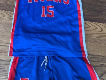 Selling with online payment: Titans reversible singlet plus shorts 