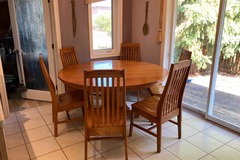 Individual Seller: 60 inch solid oak round table and 6 matching chairs