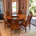 Individual Seller: 60 inch solid oak round table and 6 matching chairs
