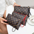 Buy Now: 40pcs fashionable pentagonal handbag, wallet and mobile phone bag