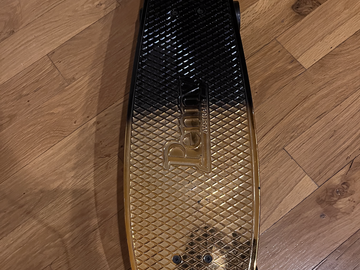 Selling with online payment: PENNY 27" BLACK GOLD FADE METALLIC SKATEBOARD