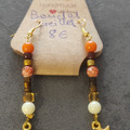 Sale retail: Boucles d'oreilles avec perles orange