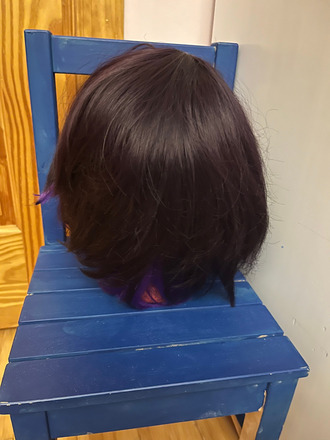 Short black wig with purple highlights