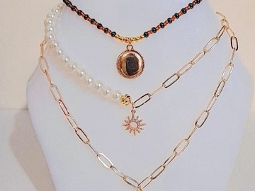 Productos: Collares en perla y cadena en rodio