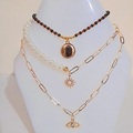 Productos: Collares en perla y cadena en rodio