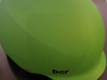 Winter sports: Teen’s Bern green helmet 