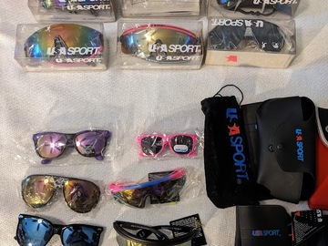 Selling with online payment: 14 USA Sport sunglasses, 2 Liberty Sport Rec Specs, black cords