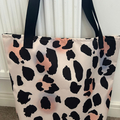 Offering: Animal print bags, mouse pads and laptop covers 