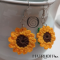 Productos: Aretes tejidos de girasol