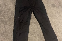 Winter sports: View from black ski pants