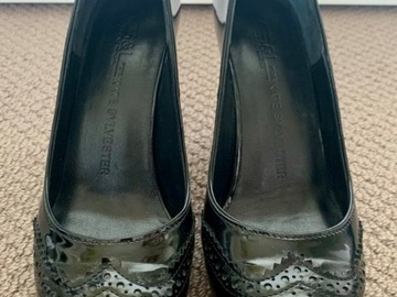 Selling: Black patent pumps