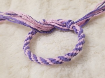 Vente au détail: Bracelet kumihimo rose et violet. 