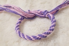 Vente au détail: Bracelet kumihimo rose et violet. 