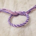 Vente au détail: Bracelet kumihimo rose et violet. 