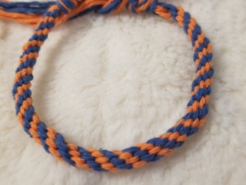 Vente au détail: Bracelet kumihimo bleu et orange 