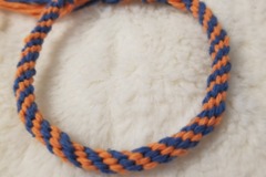 Vente au détail: Bracelet kumihimo bleu et orange 