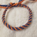 Vente au détail: Bracelet kumihimo bleu et orange 
