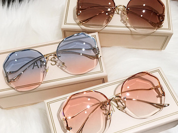 Bulk Lots: 50 pcs Fashion Rimless Sunglasses Sunscreen Glasses