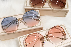 Bulk Lots: 50 pcs Fashion Rimless Sunglasses Sunscreen Glasses