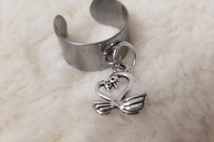 Vente au détail: Bague réglable avec breloque cygnes 