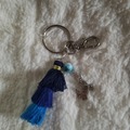Sale retail: Porte clé avec pompon bleu crabe