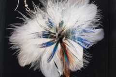 Vente au détail: Boucles d'oreilles de plumes blanches