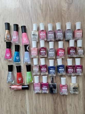 Sally Hansen Nail Polish. Lot of 33. Mega strength and Insta Dri