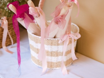 Selling: Four plain white umbrellas