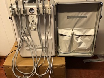 Nieuwe apparatuur: Portable dental unit in reiskoffertje