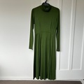Selling: Turtleneck green dress