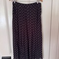 Selling: Polka dot pleated black/baby pink skirt Large