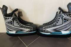 Verkaufen mit Online-Zahlungen: CCM U+ Pro Eishockeyschuhe