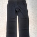 Selling: Black trousers with large button