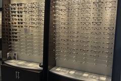 Selling with online payment: Custom EyeDesigns Frame Boards with dispensing tables.  