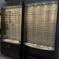 Selling with online payment: Custom EyeDesigns Frame Boards with dispensing tables.  