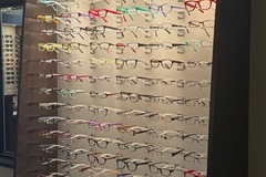 Selling with online payment: Custom EyeDesigns Frame Boards with dispensing tables.  