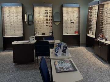 Selling with online payment: Custom EyeDesigns Frame Boards with dispensing tables.  