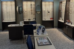 Selling with online payment: Custom EyeDesigns Frame Boards with dispensing tables.  